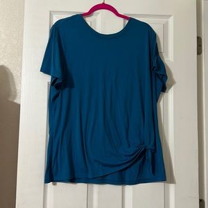 Light weight tee with knot at bottom left